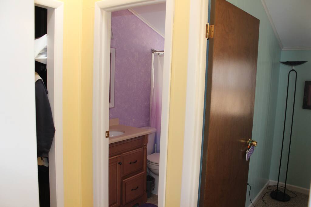 Bath (with tub) and bedroom from hall