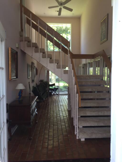 Front entry and stairs up to the in-law apartment