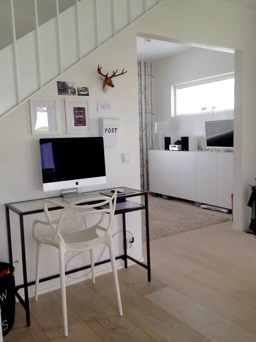 Other side of livingroom + view to extra room