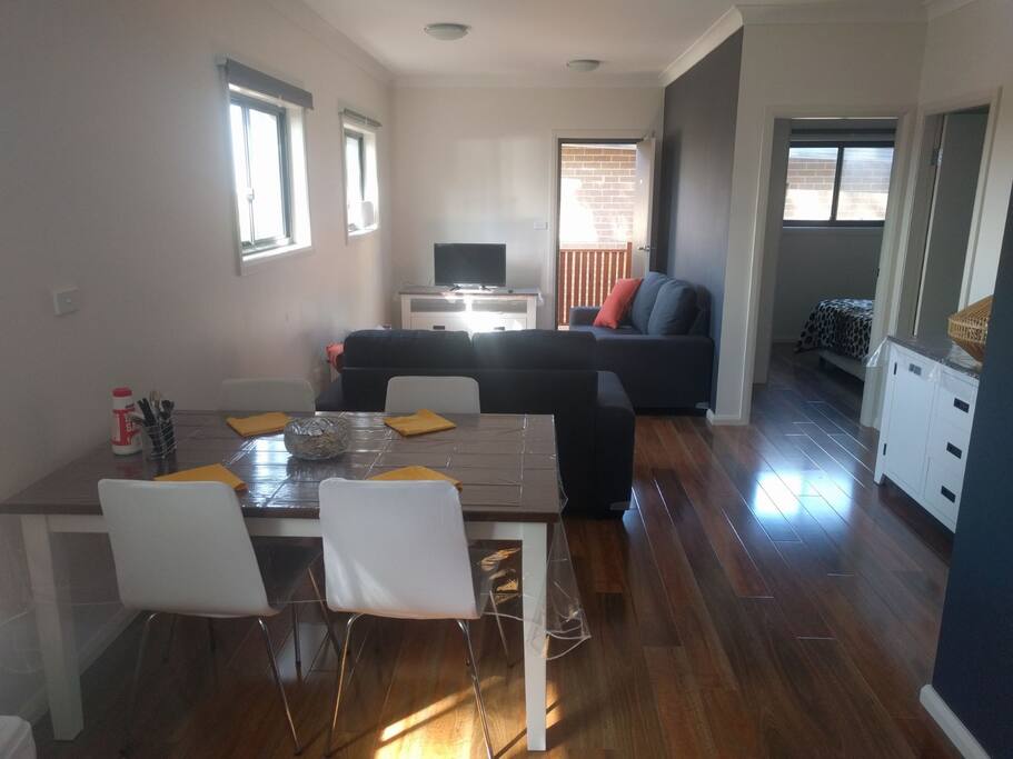 Gorgeous brand new furniture. A table easily sits 4. ALL cutlery, plates and kitchen basics (cooking oil, salt) included.
