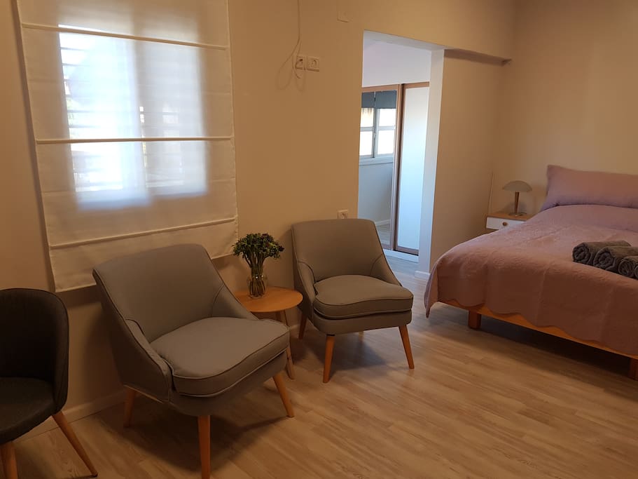 bedroom with sitting corner