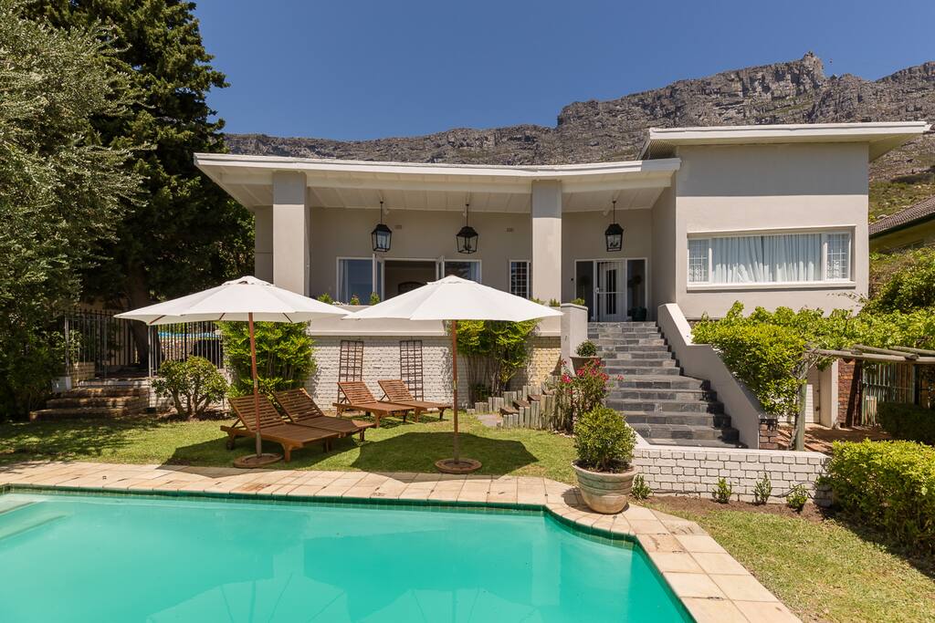 The villa nestling against the mountain