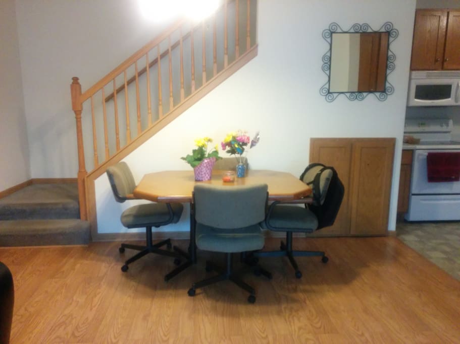 Living room split with dining - oak table and chairs for your use.