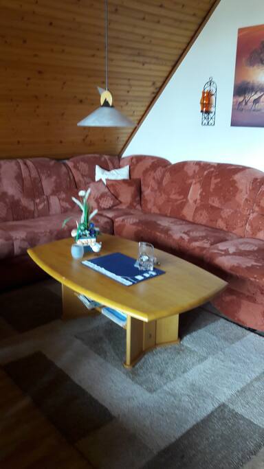 Wohnzimmer mit Schlafsofa