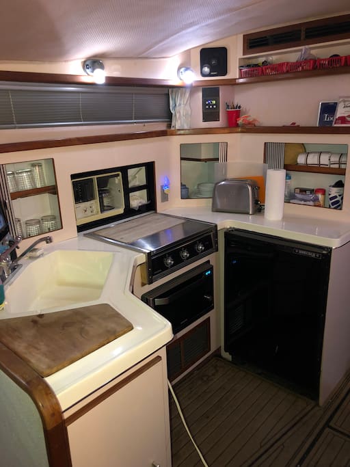 Full galley fully supplied with everything needed to prepare meals.