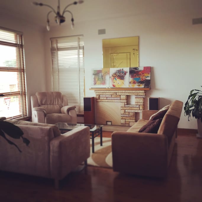 Living/lounge room, artsy upstairs common area shared