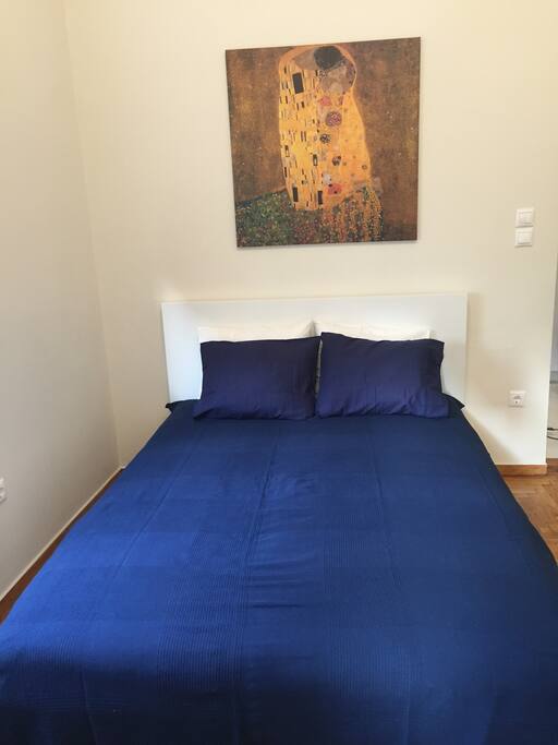 main room with queen bed
