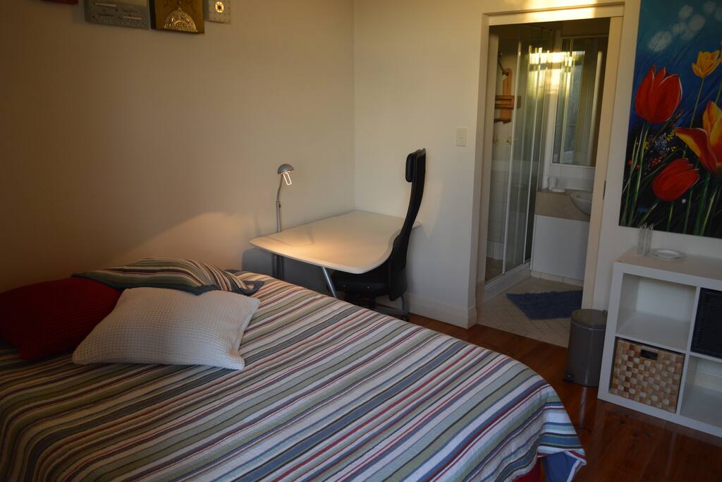 Private desk and ensuite bathroom.