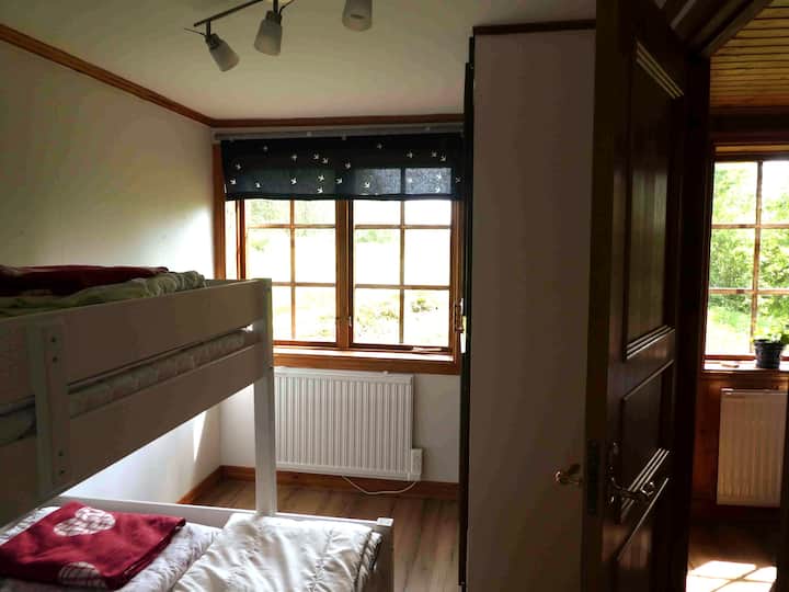 From kitchen to second bedroom with a bunk bed and wardrobe