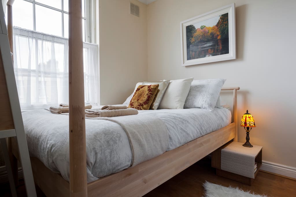 It's a cosy double room that's small but has a surprising amount of storage. Large suitcases slide easily under the bed, after you've unpacked into the wardrobe.