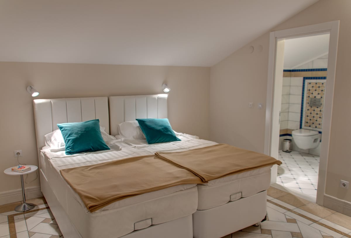 Second floor lounge area with bathroom.