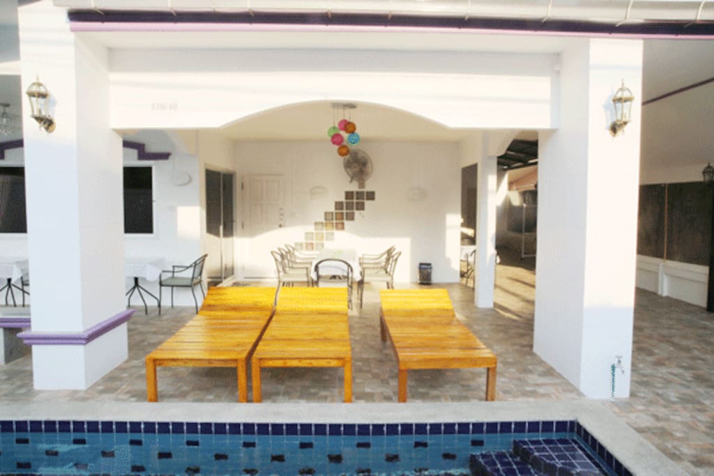 Plenty of Sunbeds for Relaxing at our Villa
