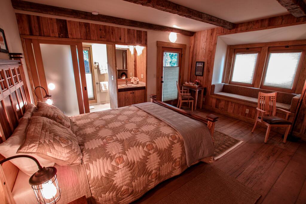 Maple room looking to bathroom and window seat