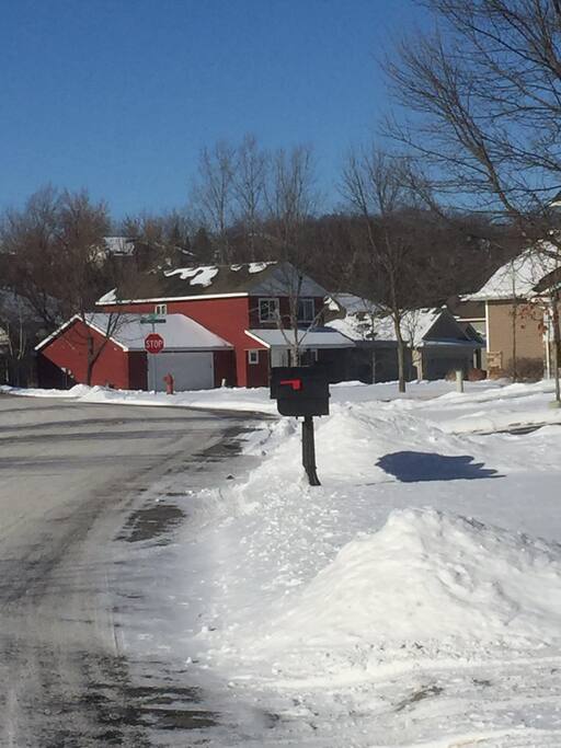 There is the home! The little red home on the block!