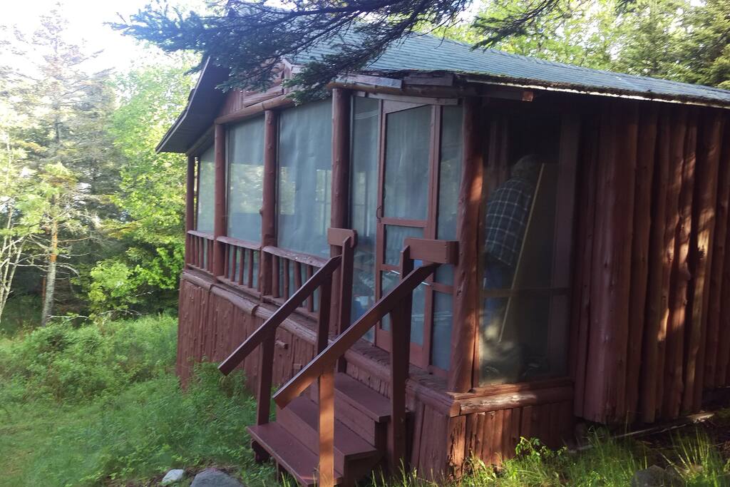 Front of cabin. Screened porch.