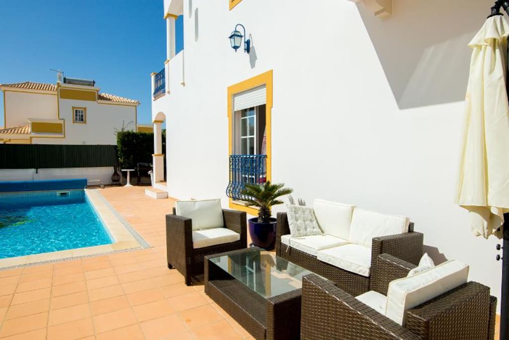 Seating area next to heated pool