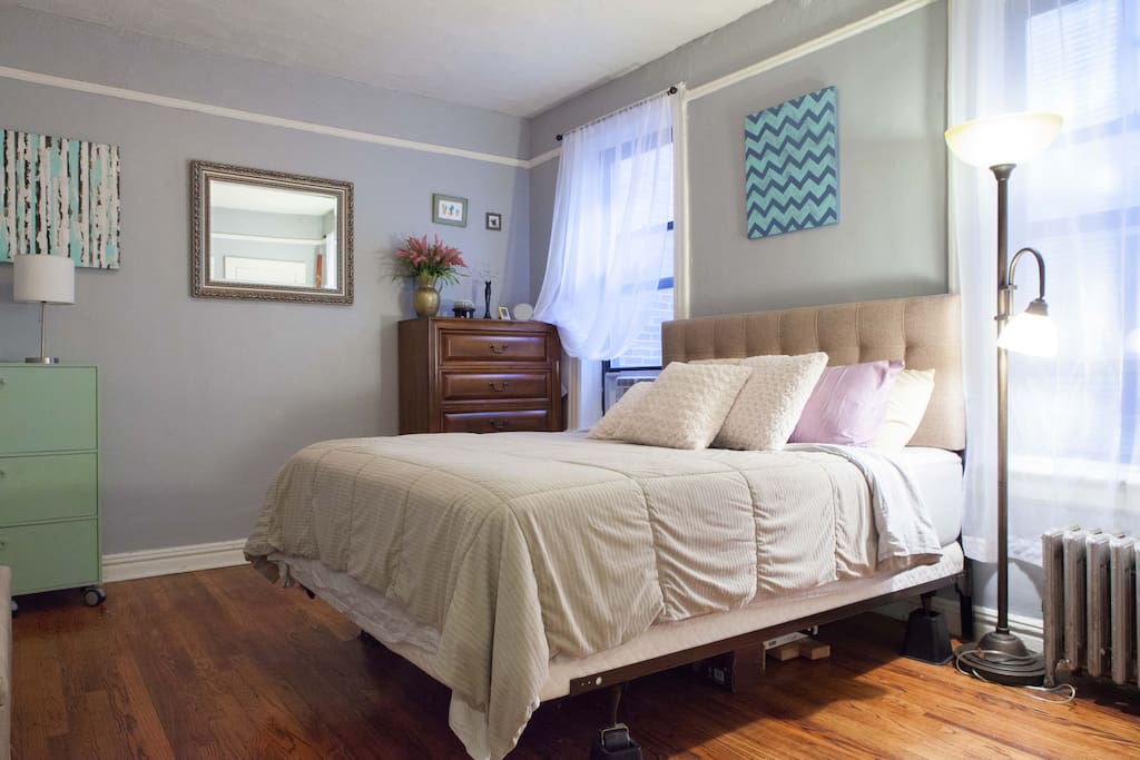 Large, cozy master bedroom with luxurious, incredibly comfortable Queen-sized bed and large dresser providing plenty of storage (especially convenient for our longer-staying guests).