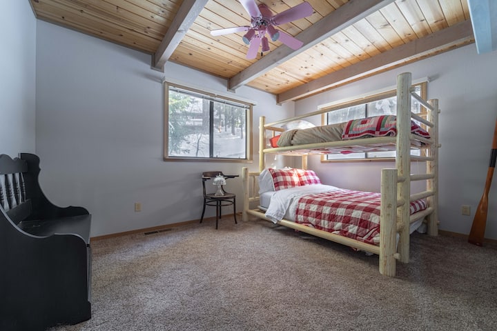 Main level bedroom with twin-over-full bunk bed.