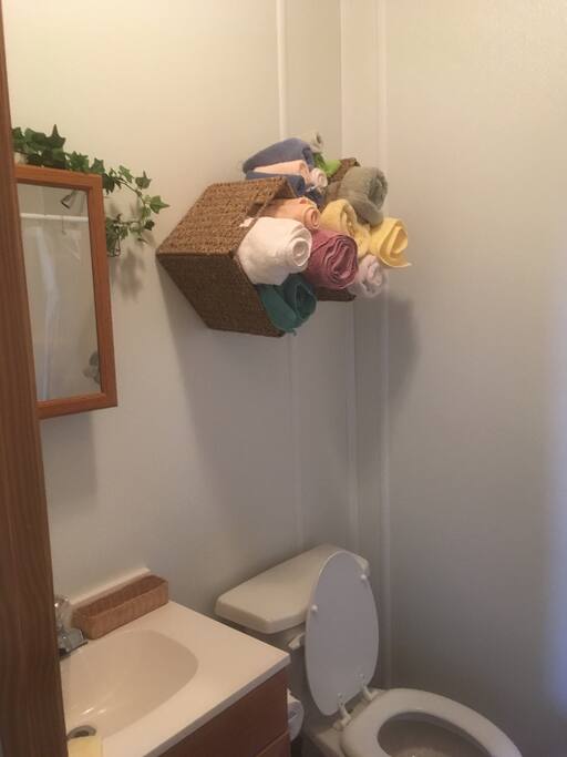 Shower, toilet and sink in each bath