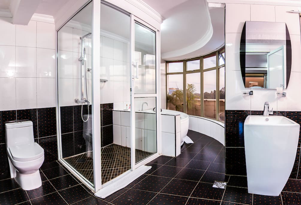 Bathroom with Jacuzzi and shower