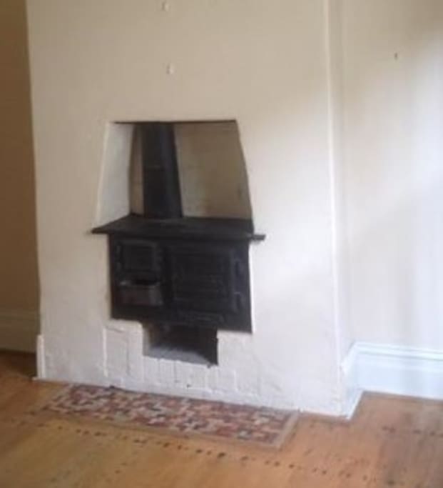 Working fireplace in room, however central heating keeps the house warm in winter