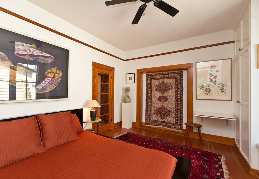 The king size master bedroom is spacious and comfortable.