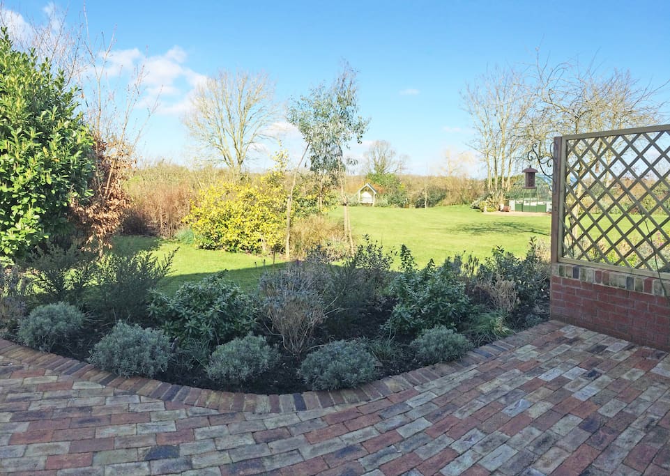 Patio and views across the garden