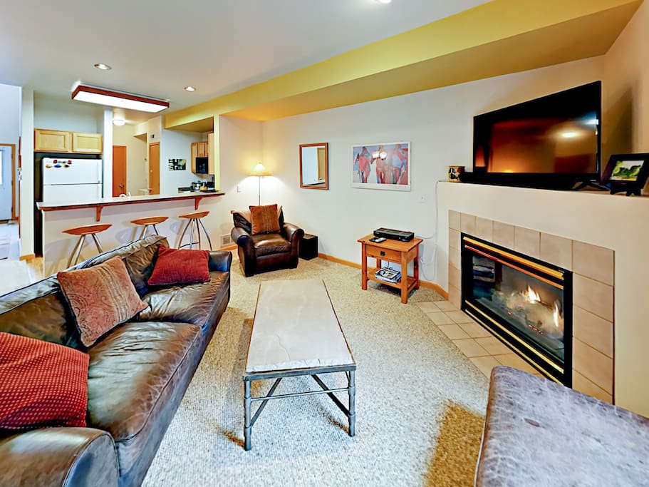 Kick back on a comfy sofa and armchair for a movie screening on the flat screen TV.