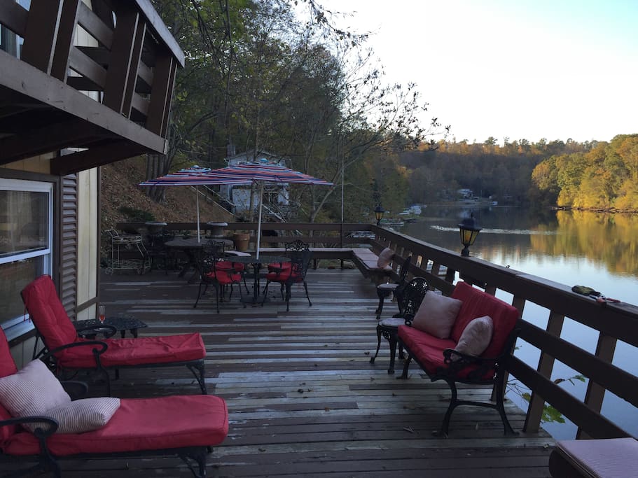 Large deck is ideal for playing family games while cooking out and fishing directly from the deck! Enjoy friendly visits from the ducks on the river- they will always enjoy any snacks you have to offer:)