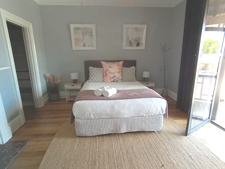 Master Queen bedroom with walk in robe & private balcony