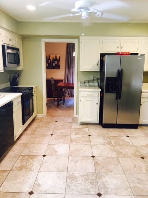 Great kitchen with access to dining room next door, and a two stool pub table in kitchen (unable to see in picture)