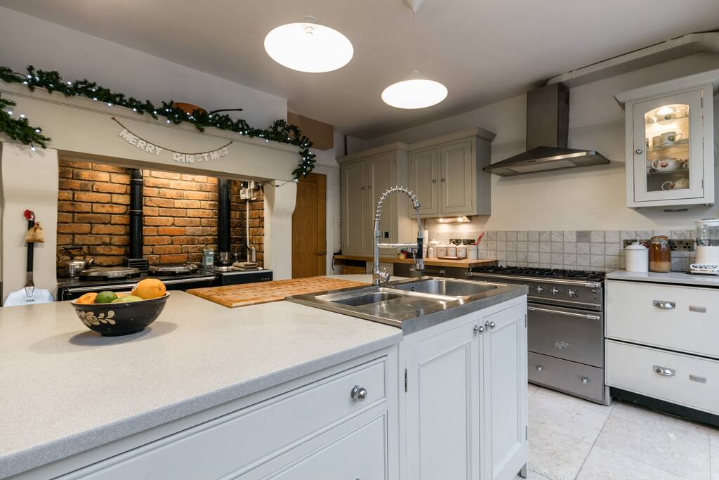 Kitchen conservatory,
Aga and Lacanche cookers, fridges, dishwashers, coffee bar for tea coffee or cocktails