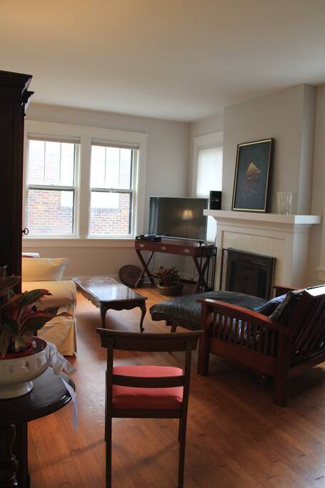 Relaxing living room with a 49-in screen TV with cable and internet