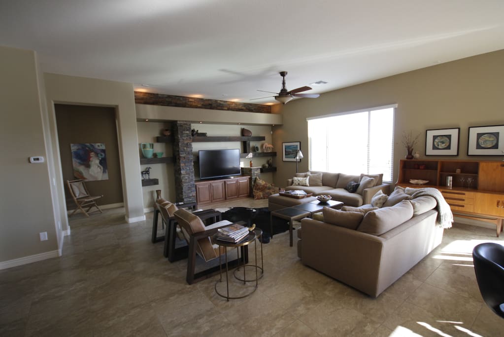 Great room with 60" TV and room for everyone.