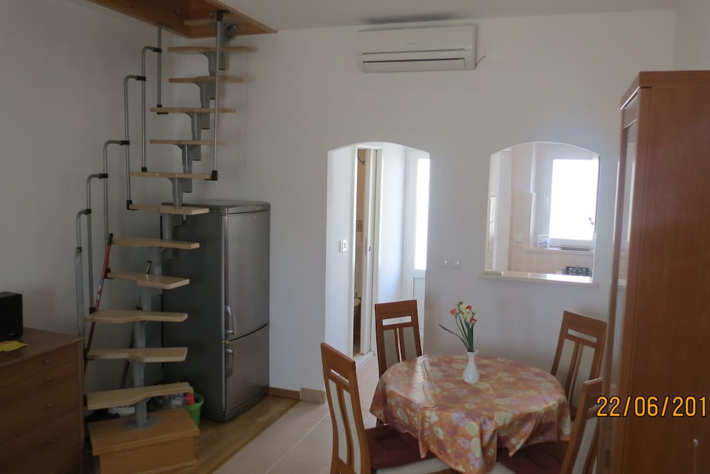 Living room + stairs to the loft space