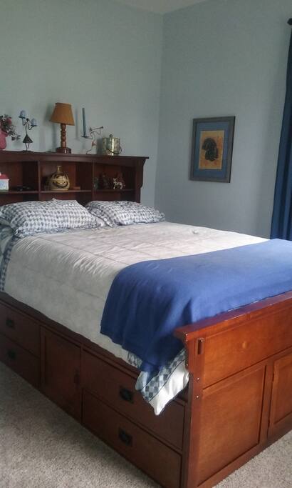 Comfy captain's style queen bed