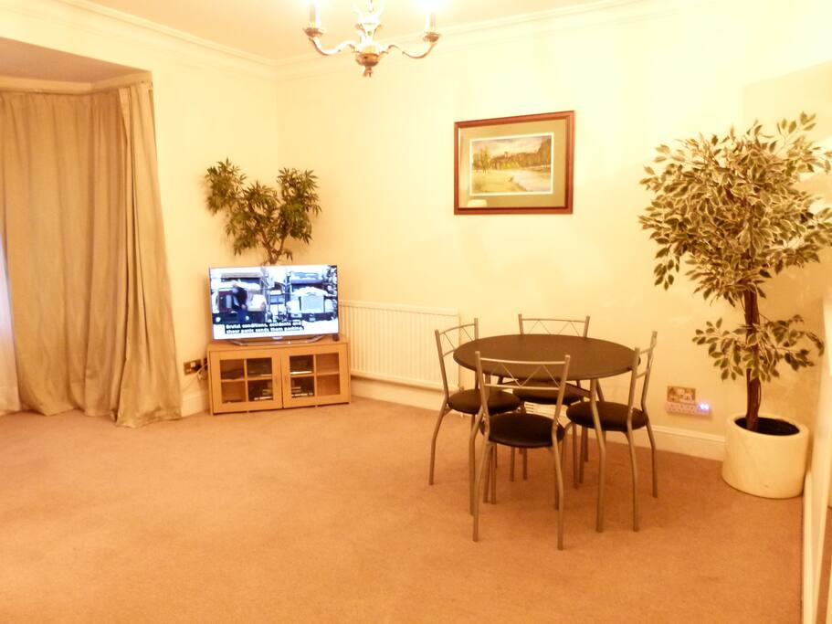 Lounge with sofa bed ,TV ,WiFi and Dining table