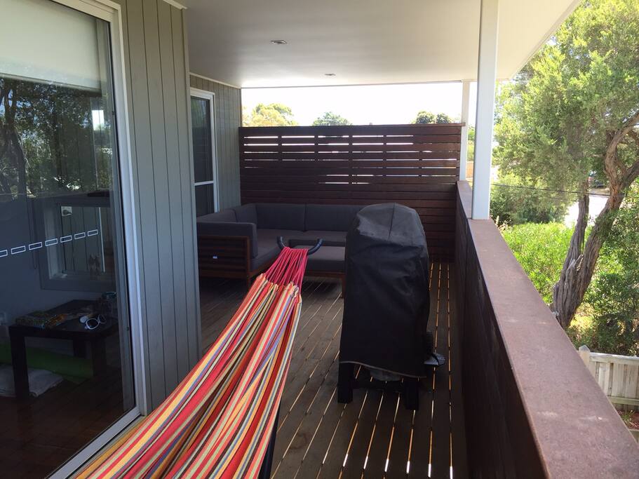 Front Deck overlooking Arthurs Seat with Weber Q, lounge area and hammock