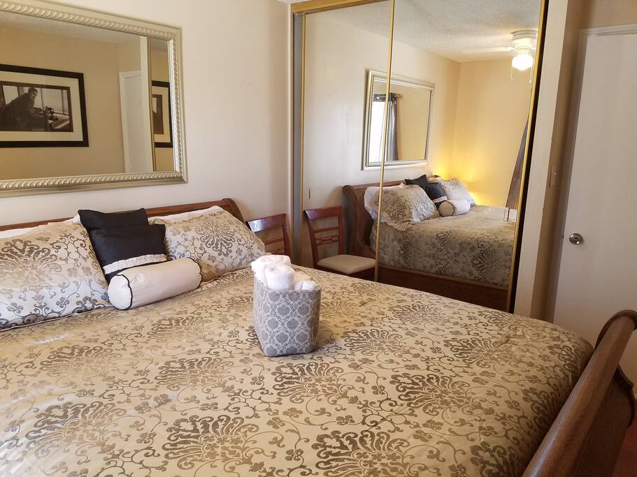 NEW King sized sleigh bed with hotel quality linens and fresh towels