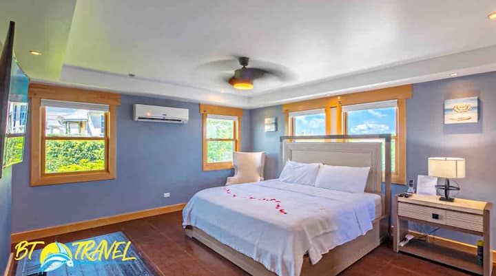 King bed, ensuite bath, walk in closet, private patio and calming views.