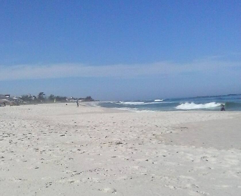 The sunny white sands, just in front of the Condominium