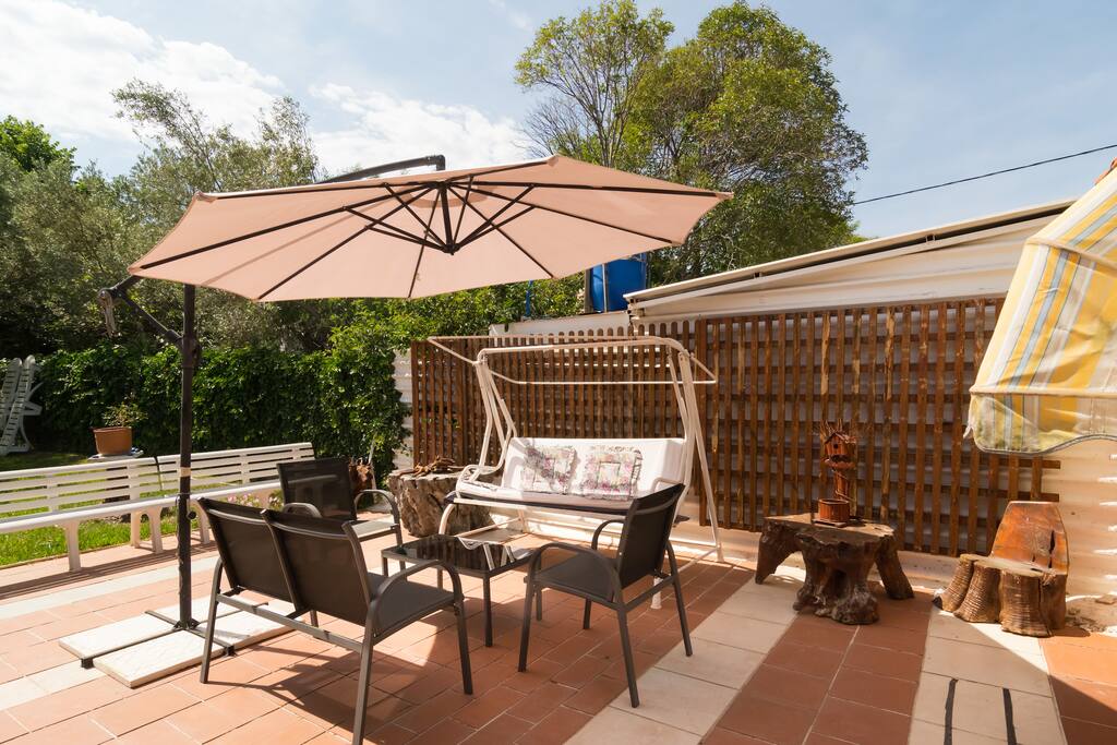 A great place outdoors with beautiful garden view.