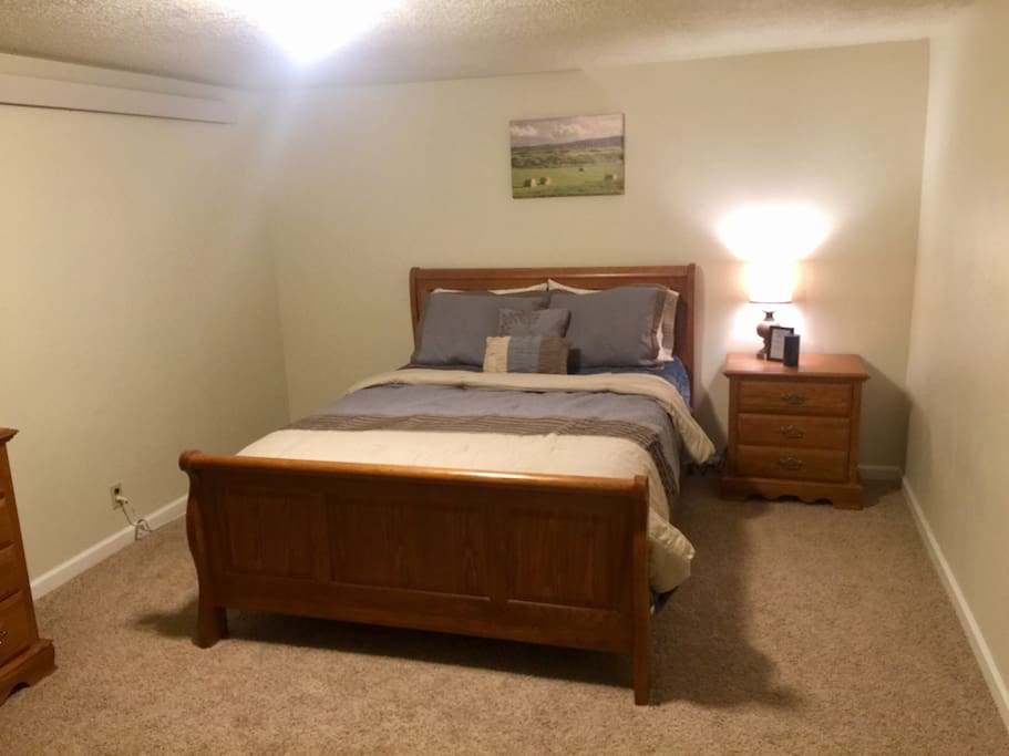 Queen bed in master bedroom
