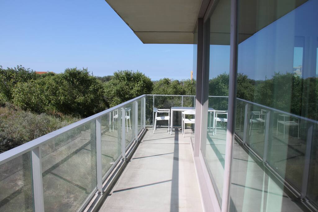 Terrace surrounding the apartment providing sun THE whole dat rond.