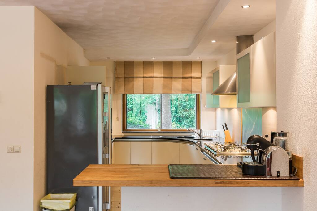 Kitchen with coffee machine