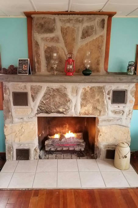 Gas fireplace. Working vintage oil lamps.