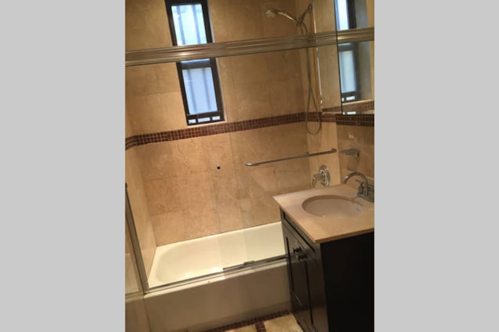 bathroom with shower (shower is shared with other guests)