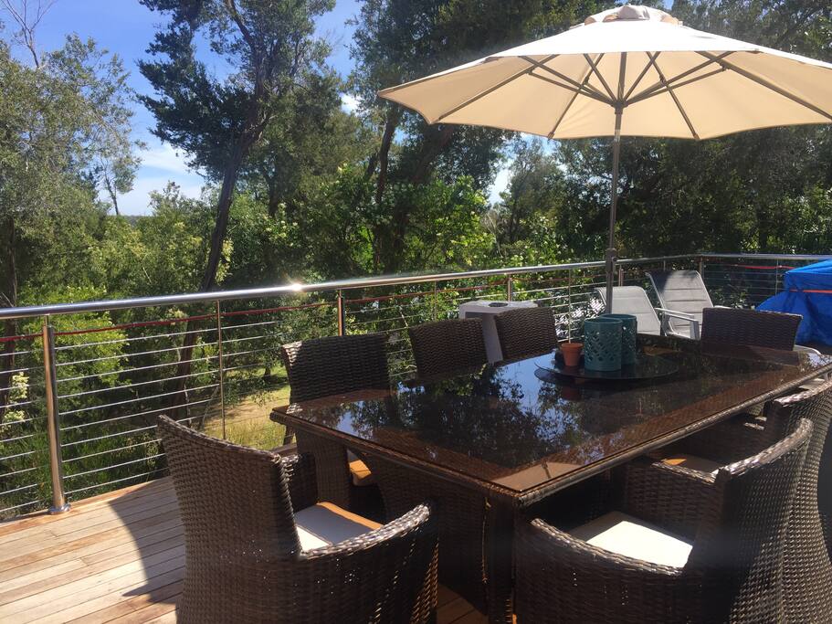 Large balcony set up in the treetops - no fences to see