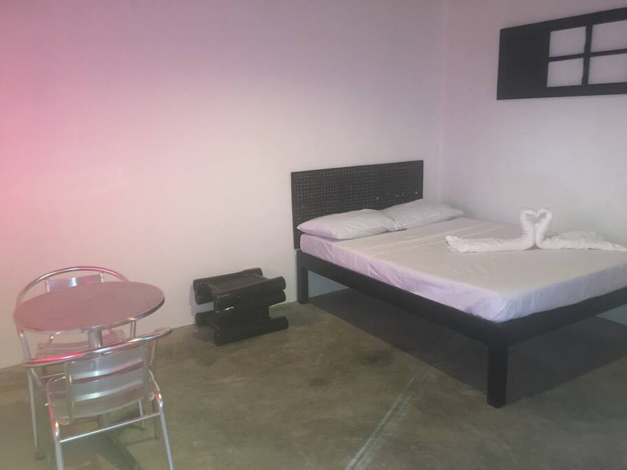 Seaview air-condition room good for 2 persons with 1 Queen bed. TV/Sat, hot @ cold shower with Veranda and free breakfast. P2300 per night