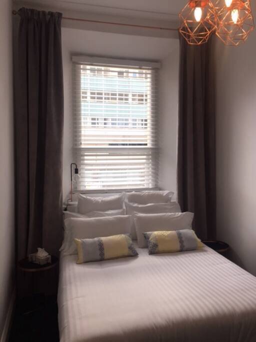 Comfy bed with selection of pillows